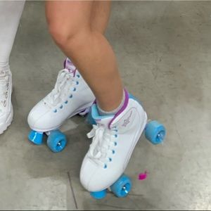 White blue and purple roller blades